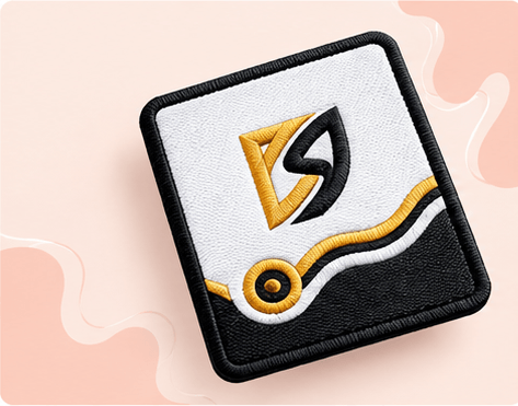 Square embroidered patch with a bold black, white, and gold stitched design